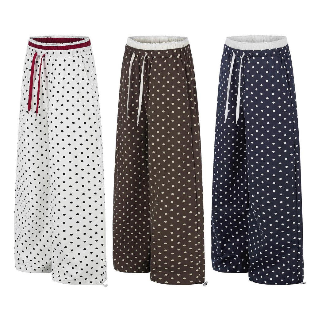 Ruffle-trimmed Printed Straight-leg Pants In Solid Color