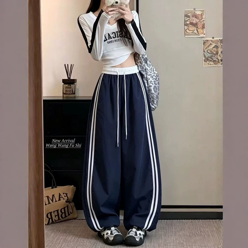 High-waisted Loose-fitting Ankle-tied Striped Pants