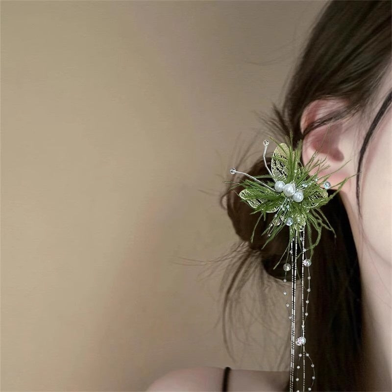 Ethereal Butterfly Pearl Tassel Headpiece With A Fairy-like Feathered Sidesophisticated And Luxe