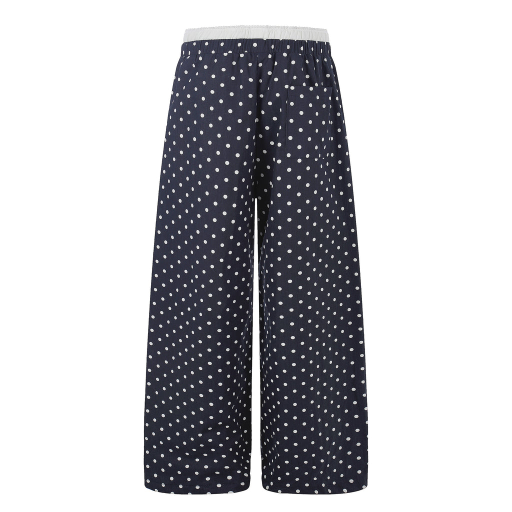 Ruffle-trimmed Printed Straight-leg Pants In Solid Color