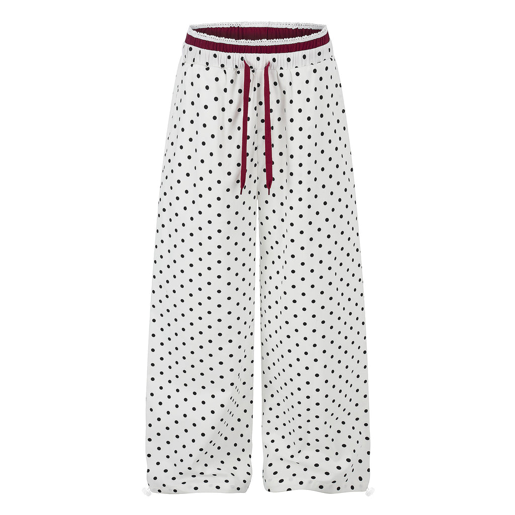 Ruffle-trimmed Printed Straight-leg Pants In Solid Color