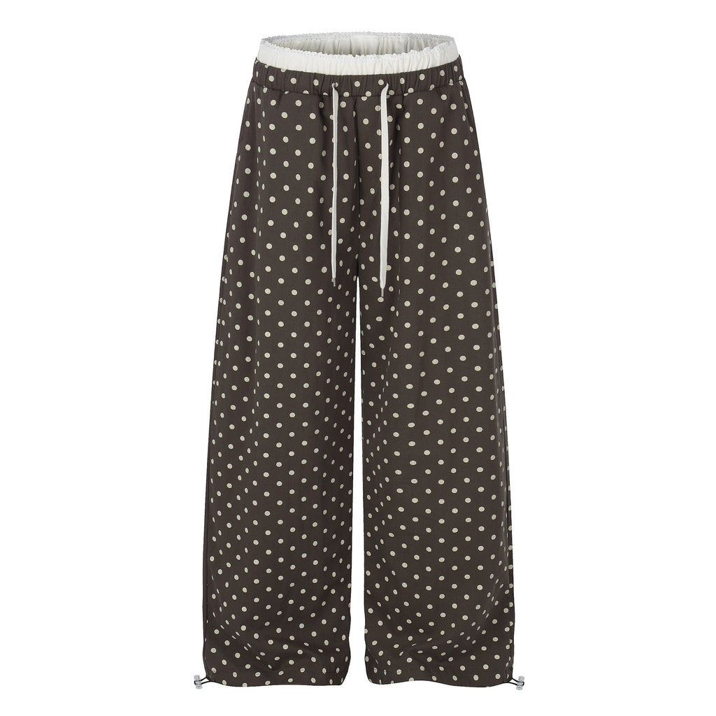 Ruffle-trimmed Printed Straight-leg Pants In Solid Color