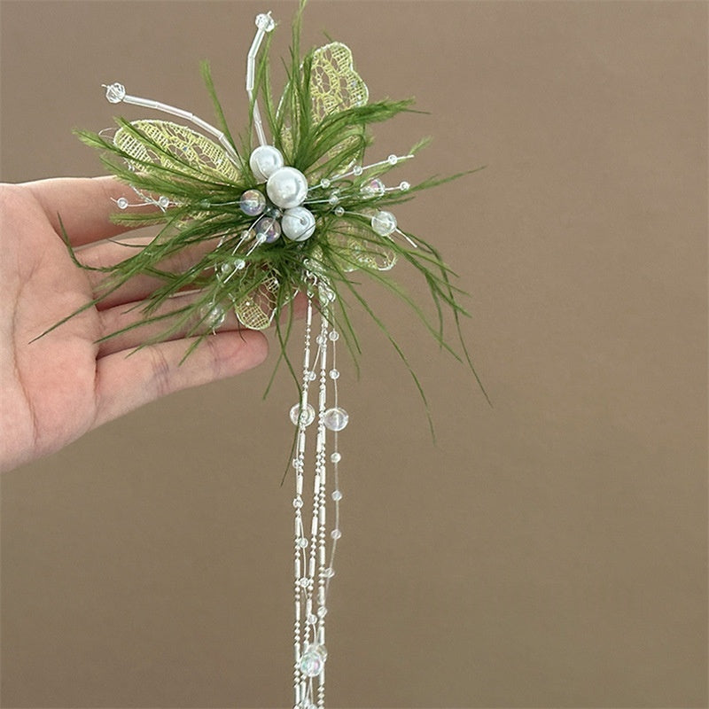 Ethereal Butterfly Pearl Tassel Headpiece With A Fairy-like Feathered Sidesophisticated And Luxe