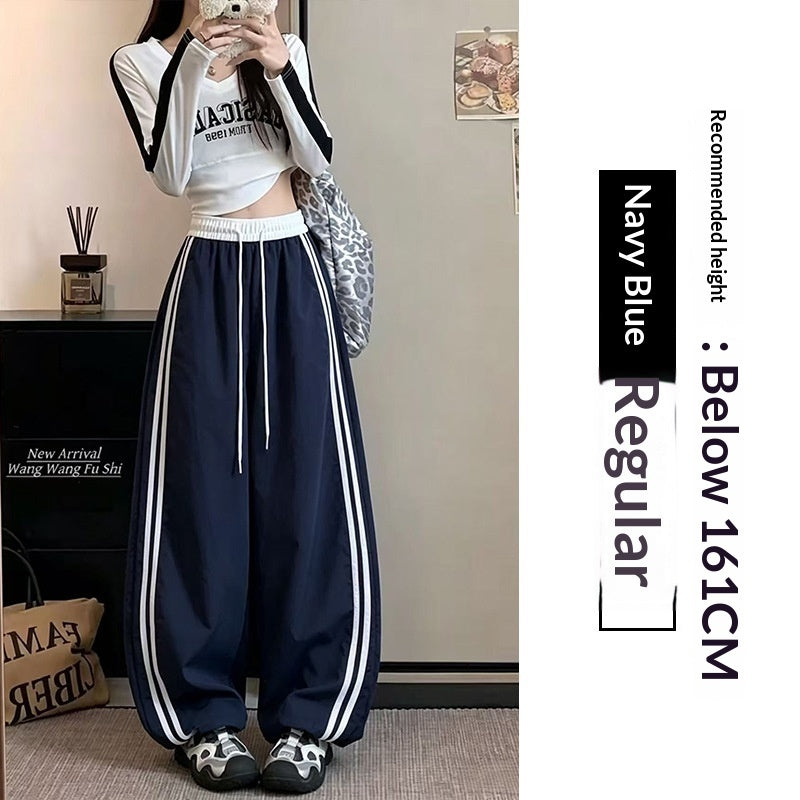High-waisted Loose-fitting Ankle-tied Striped Pants